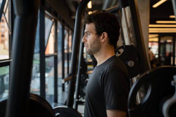 istock Young man at the gym 1222244341