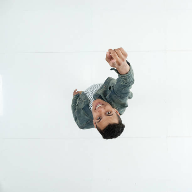 istock Male in front of white background wearing denim jacket 1222244645