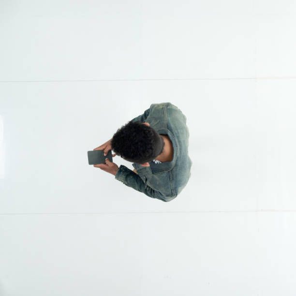 istock Male in front of white background wearing denim jacket 1222244698
