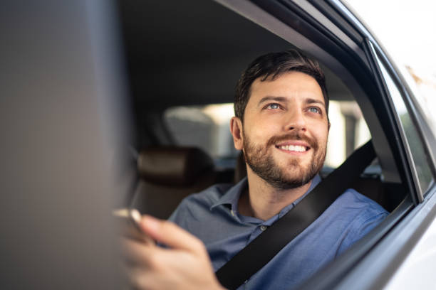 istock Businessman looking through the window inside a car 1222245642