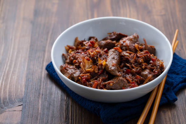 istock meat with vegetables in white bowl 1222246206