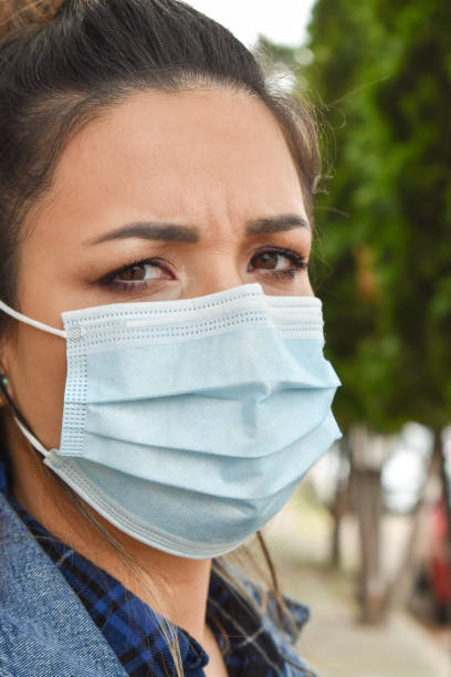 istock Woman outdoors with a face mask 1222248137