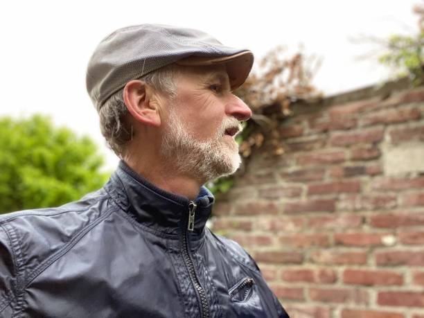 istock Senior Biker in the rain 1222248362