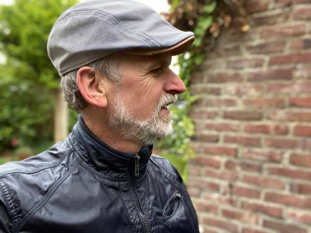 istock Senior Biker in the rain 1222248364