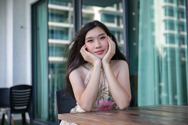 istock Beautiful women smiling and sitting at table 1222249617