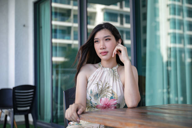 istock Beautiful women smiling and sitting at table 1222249618