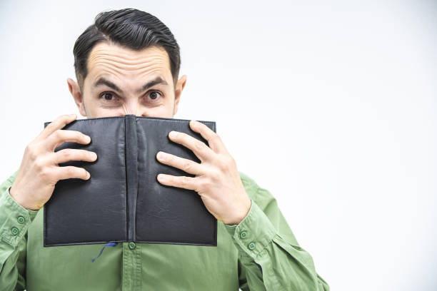 istock Disappointed young caucasian businessman reading documents, frowning his face, found mistake in report. 1222251180