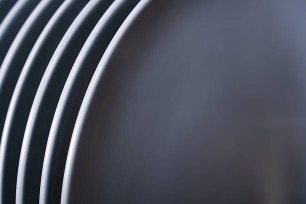 istock Clean gray plates in dishwasher 1222251317