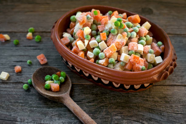 istock frozen vegetables in a bowl on a wooden table 1222252209