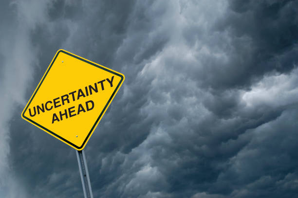 istock Caution Sign in Front of Storm Clouds 122225248