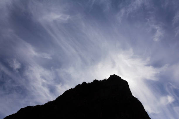 Hunter Trail offers dramatic views of Arizona's Picacho Peak, as it winds towards the summit. The hike is rated difficult, because of steep inclines and several up-and-down cable sections. Reports vary on how long the trail is, but the park itself says it's two miles to the summit of the peak. Picacho, by the way, means peak in Spanish. So the name is redundant, when translated: Peak Peak. The iconic landmark is easily spotted just north of Tucson, near Interstate 10.