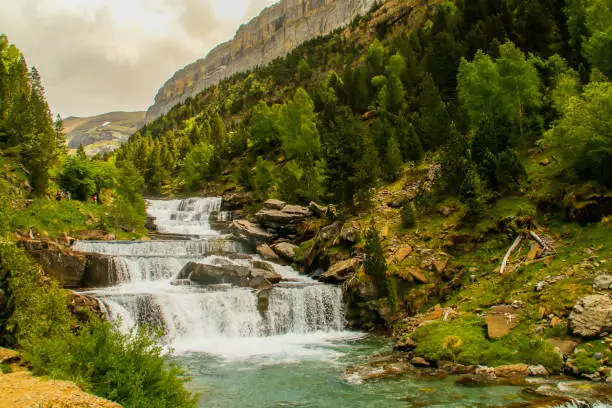 Beautiful waterfall of the Arazas river in Ordesa y Monte Perdido National Park (Parque nacional de Ordesa y Monte Perdido) is an IUCN Category II National Park situated in the spanish Pyrenees, Huesca. There has been a National Park in the Ordesa Valley since 1918.
