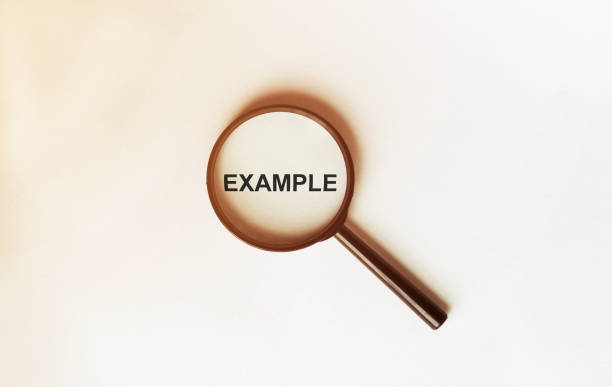 una imagen conceptual de un fondo blanco aislado de lupa con una palabra ejemplo zoom dentro del vidrio - focus magnifying glass definition single word fotografías e imágenes de stock