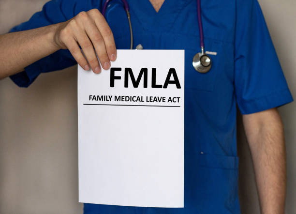 istock Page with FMLA family medical leave act on a table. 1222254057