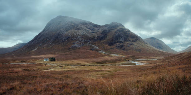 istock A remote hut at the foot of a mountain 1222255932