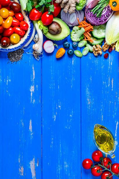 istock Vegan food: healthy fresh vegetables border. Copy space 1222257140
