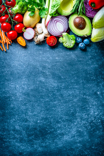 istock Vegan food: healthy fresh vegetables border. Copy space 1222257215