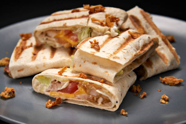istock fresh roll of thin lavash or pita bread filled with grilled meat 1222259019