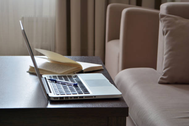 istock Online and remote work or home distance education concept. Home studio workspace with laptop computer 1222260723