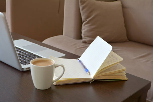 Online and remote work or home distance education concept. Home studio workspace with laptop computer