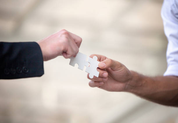 istock Business people shaking hands after successful negotiations 1222260835