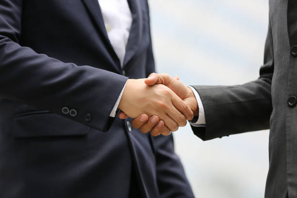 istock Business people shaking hands after successful negotiations 1222260928