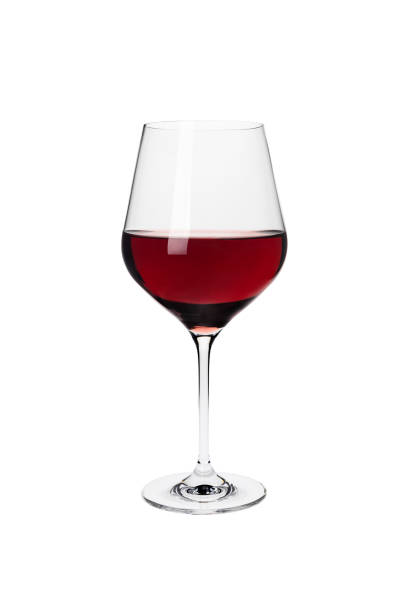 istock Red wine in a glass isolated on white background 1222268421
