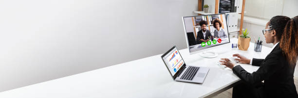 istock Happy Businesswoman Videoconferencing With Her Colleagues 1222273140