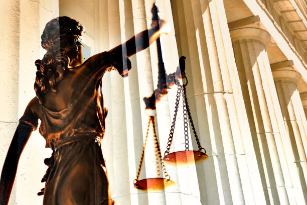 istock Multiple Exposure of Lady Justice Statue And Greek Columns 1222273673