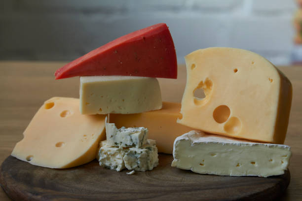istock Various types of cheese composition on wooden cutting board, selective focus 1222277603