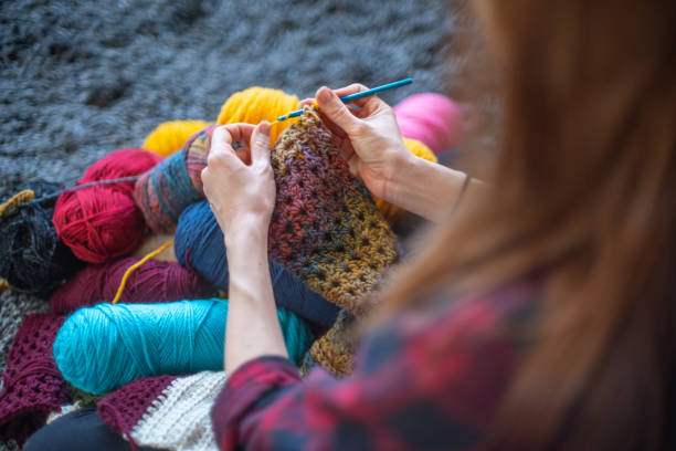 istock Woman knitting at home during Covid-19 1222277713