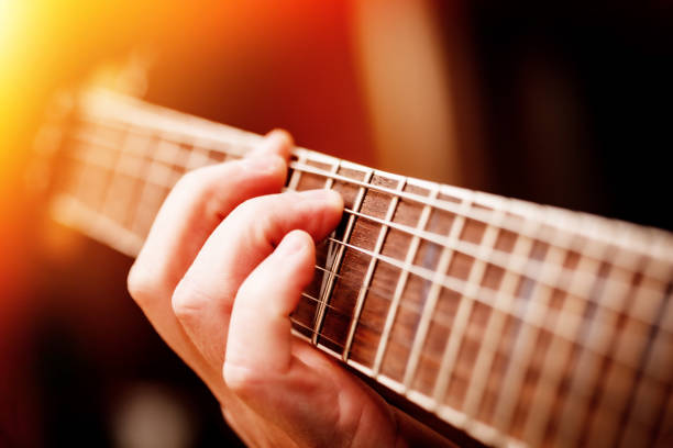 istock Man Playing Guitar on a Stage. Musical Concert 1222279064