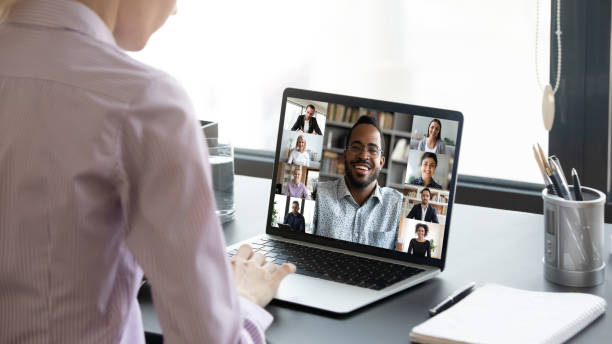 istock Woman worker engaged in online team briefing on computer 1222279363