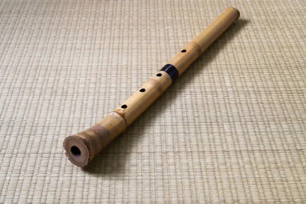 Pictured Bamboo Flute called Shakuhachi on the tatami.