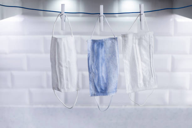 istock To dry the face mask by hanging it on a rope 1222288570