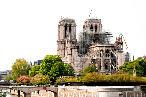 Notre Dame Cathedral in Paris after the fire destroyed the whole roof and Viollet-le-Duc arrow, in April 15th, 2019.