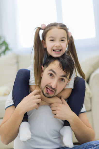 istock Single dad has to play with her little daughter. 1222292233