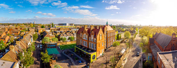 Aerial view of school in London suburb in the morning, UK Aerial view of school in London suburb in the morning, UK chiswick stock pictures, royalty-free photos & images