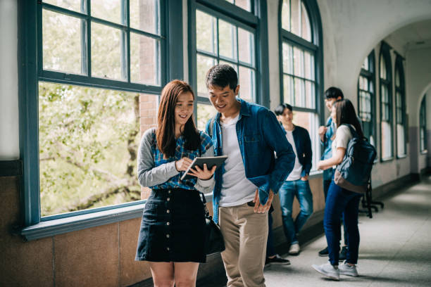 istock University education during and after Coronavirus pandemic - students keep social distance 1222295432