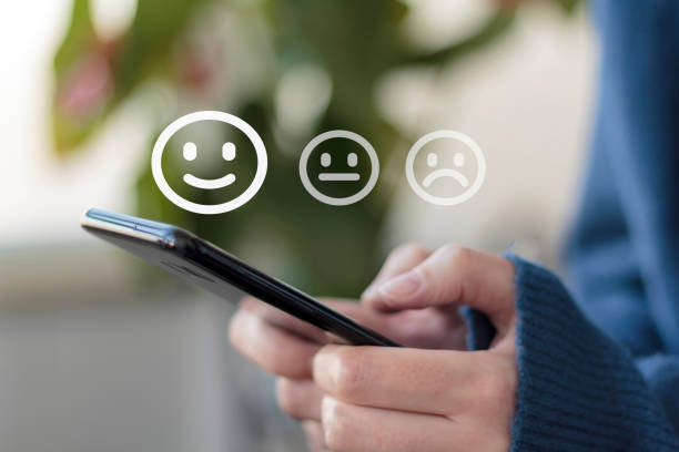 istock Woman using smartphone for service rating and customer satisfaction 1222296499