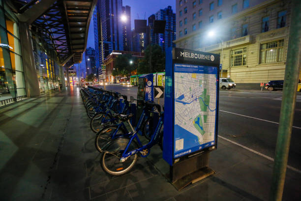 Melbourne, Australia-November 12, 2015: Bike share options are available in Melbourne. Public Transport serves metropolitan areas of Melbourne, Australia. The system combines buses, light rail, bike shares, and trains and unites the urban and suburban regions of greater Melbourne. The system combines paid and free fare transit options. Image shot around downtown Melbourne during the morning of November 12, 2015.