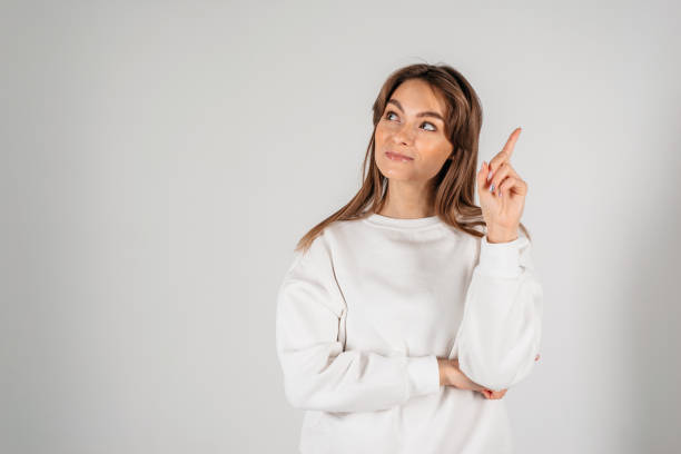 istock Young pretty woman having a good idea - isolated over a white background 1222299607