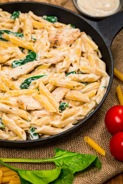 istock Chicken Alfredo Spinach Parmesan Pasta 1222307804