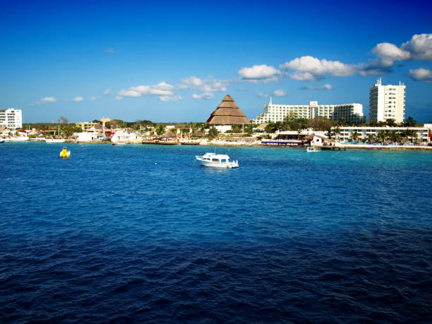 istock Cozumel city, Mexico with clouds rolling by 1222309513