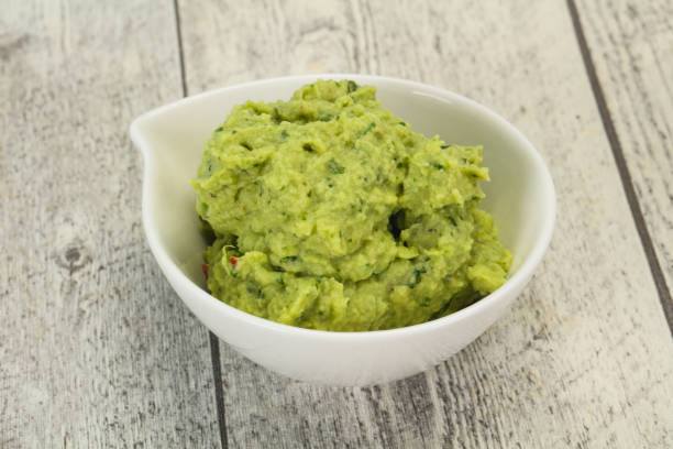 istock Avocado guacamole sauce with chili pepper 1222310918