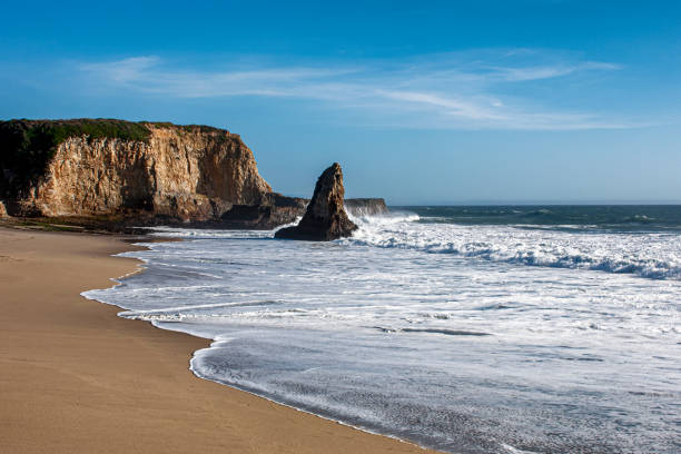 istock Ocean Waves Crashing on Rocky California Coast Beach 1222311775