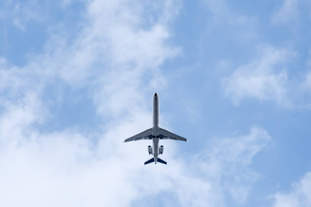 istock Low angle view of a flying aeroplane 1222312613