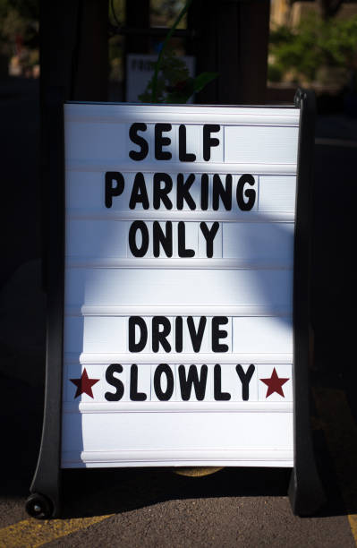 istock Social Distancing Reopening Sign: SELF PARKING ONLY 1222313173