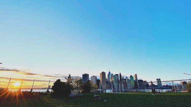 istock Sunset on Downtown Manhattan from a Brooklyn Park 1222320316