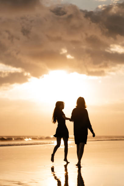 istock Attractive man and woman enjoying romantic evening on sunset 1222321150